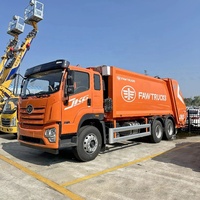FAW 6X4 Compacteur hydraulique à transmission manuelle 25 tonnes Diesel Véhicule de collecte des déchets Camion de ramassage des ordures