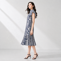 Robe chemise boutonnée à col pour femme, manches courtes à volants, imprimé feuilles tropicales, ourlet étagé, robe d'été décontractée pour la plage et les vacances