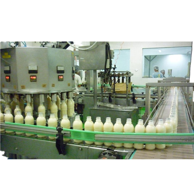 Stainless Steel PLC Control Automatic Soy Milk Production Line With Multi Station Rotary Filling System