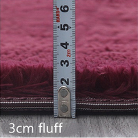 Couverture en polyester moelleuse de couleur unie, tapis shaggy antidérapant avec design arrondi, couverture douce et duveteuse pour le salon