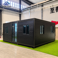 Maison conteneur extensible moderne à structure en acier de 20 pieds, mini-maison préfabriquée avec conception à double aile pour jardin, cour arrière ou entrepôt