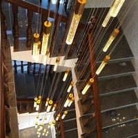 Lustre long en cristal de luxe, luminaire suspendu moderne avec tiges en verre pour villa, escalier, salon, hall d'hôtel, décoration