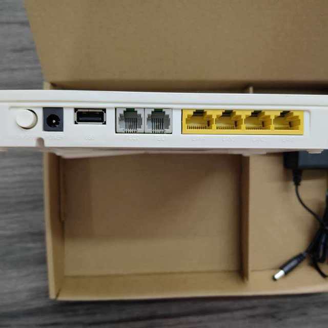 Hot Sale HG845H XPON ONU 4GE+2Tel+USB+WiFi Modem Router SC/UPC FTTH Fiber Optical Terminal