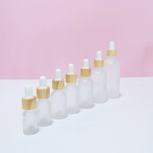 1 oz <b>Dropper</b> Glass Cosmetic Pipette <b>Bottle</b> 30ml Round Matte clear Amber Serum <b>Bottles</b> with Rose Gold Screw Lid - Product Image 3