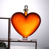 Bouteille en verre soufflé à la main de 1000 ml en forme de cœur pour spiritueux, vodka, vin et whisky – Vente en gros personnalisée et unique