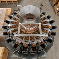 Peseuse combinée automatique à 20 têtes pour noix, biscuits, grains de café, aliments pour animaux, produits granulaires, emballage en sachets et feuilles d'aluminium