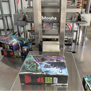 Machine d'emballage automatique pour masques faciaux, boîtes de biscuits, boîtes de snacks, emballage en cellophane, emballage de tissus, emballage de préservatifs, emballage de CD, DVD - Product Image 1