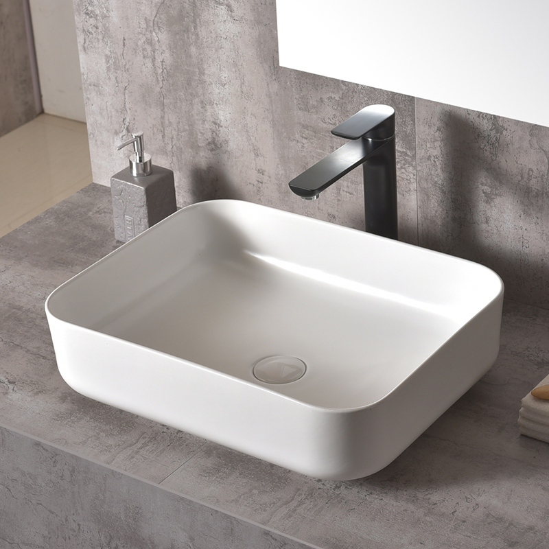 Cleaning ceramic wash basin with approved agents Cleaning ceramic wash basin with approved agents