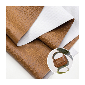 Telas de cuero reciclado Pvc con estampado de cocodrilo al <span class=keywords><strong>por</strong></span> mayor, hojas de <span class=keywords><strong>polipiel</strong></span> Rexine de <span class=keywords><strong>tela</strong></span> de toalla ecológica para bolsos y equipaje - Product Image 1