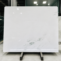 Vente en gros de dalles de marbre blanc neige sculpté au design moderne, provenant de Chine, en marbre blanc oriental poli - Pierre raffinée