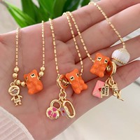 TK-B644 Collier avec pendentif ours orange en émail mignon, chaîne à perles dorées, pendentifs poupée garçon, cadenas d'amour, baseball, sirène, bijoux pour femmes et filles