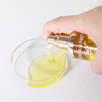 Sérum réparateur de cheveux personnalisé huile d'argan de marque privée huile de jojoba marocaine protection thermique sérum lisse pour cheveux crépus