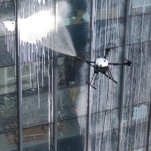 Dron de Limpieza Profesional Jiusi D15R para Edificios Altos, Limpieza de Fluidos en Altura, Operador Experto con Cámara - Product Image 1