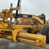 Niveleuse sur pneus Caterpillar 140K 140H d'occasion à vendre