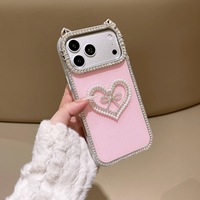 Coque de luxe antichoc avec oreilles de chat, strass, perles et cœur pour iPhone 17 16 15 Pro Max, protection 3D avec nœud et diamants scintillants