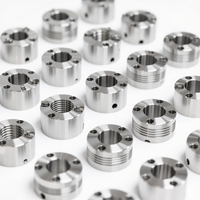 Perçage et alésage CNC pour pièces en aluminium destinées aux adaptateurs d'objectifs d'appareil photo, avec une tolérance de trou serrée et une alésage lisse