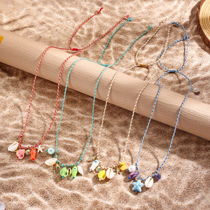 Collier de plage Boho <span class=keywords><strong>cordon</strong></span> macramé tissé à la main <span class=keywords><strong>avec</strong></span> coquillage/étoile de mer/breloques de poisson en céramique <span class=keywords><strong>bijoux</strong></span> d'été réglables pour les festivals de musique - Product Image 1