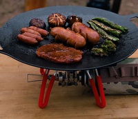 Poêle à griller ronde en fonte de style coréen créatif pour le camping en plein air, la randonnée, le barbecue et la cuisinière à induction (vente en gros)
