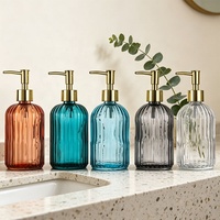 Vorrätige Bunte 400ml Flüssigseifenspender-Flasche Luxuriöse Glas-Shampooflasche mit Goldpumpe Siebdruck Gesichtsreiniger