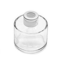 Diffuseur de parfum en verre noir de luxe 50ml/100ml/150ml/200ml avec bouchon couronne et impression sérigraphiée dorée pour aromathérapie