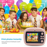 Appareil photo instantané pour enfants HZTZ avec imprimante, double objectif, vidéo HD 1080p, design mini, grand angle 180°, prend en charge les jeux amusants, pour la maison
