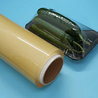 Film alimentaire en PVC de qualité alimentaire, transparent, extensible, résistant à l'humidité, emballage plastique pour aliments, en-cas, chocolat, biscuits