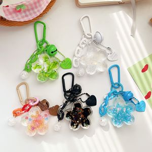 Lindo Llavero de Sakura con Efecto de Arena Movediza, Campana y Cadena, Colgante de Flor Kawaii en Negro y Azul para Accesorios de Bolsos de Niñas - Product Image 4
