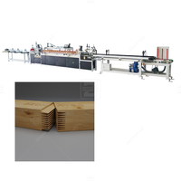 Machine à assembler les joints à rainures et languettes en bois