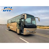 Autocar de tourisme de luxe avec 47 sièges, offrant des logements spacieux et confortables, adaptés aux voyages à courte et longue distance.