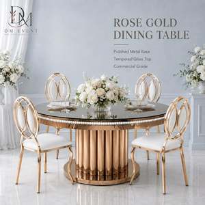 Table ronde d'événement en acier inoxydable doré avec base colonne et plateau en verre trempé miroir, finition laquée, vente en gros - Product Image 1