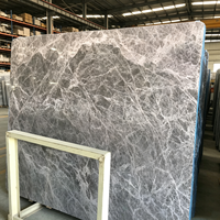 Marbre gris Athena naturel de qualité supérieure, adapté aux murs d'îlots de cuisine modernes et aux tables basses de hall d'hôtel