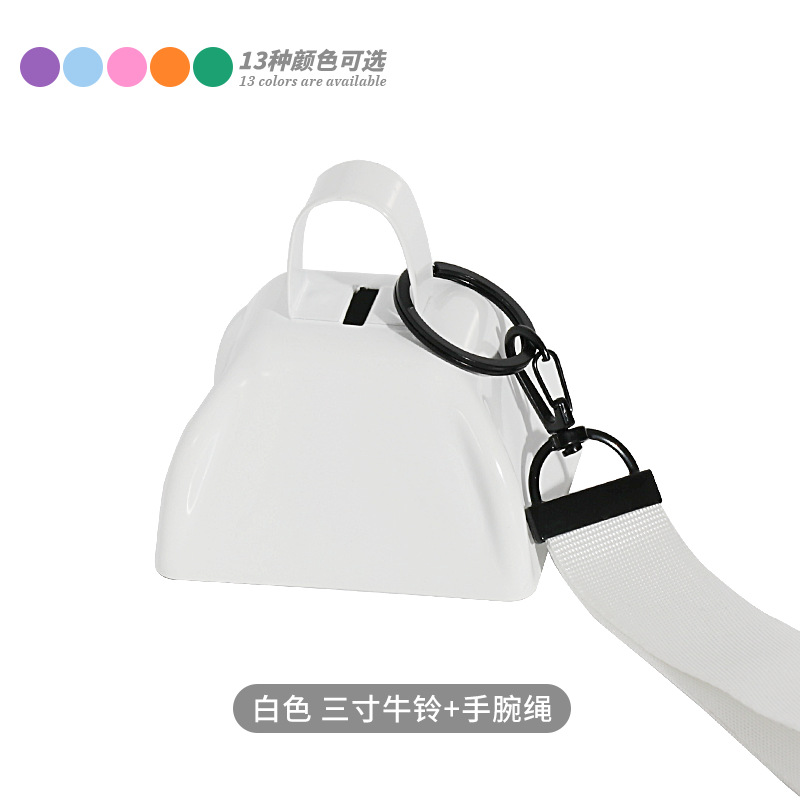 White three-inch cowbell + wrist rope