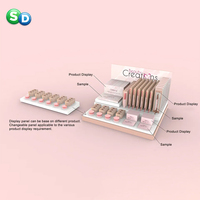 Présentoir de comptoir en carton pour magasin de rouge à lèvres de supermarché personnalisé SD pour les cosmétiques de maquillage de Guangdong