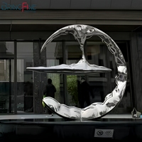 Sculpture abstraite moderne circulaire en acier inoxydable 304 poli 3D pour extérieur avec motif anneau et montagne