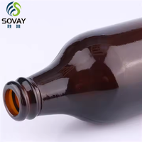 Botol kaca minuman Amber tebal bulat kustom dengan tutup dalam berbagai ukuran botol bir