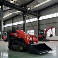 Mini-chargeuse sur chenilles SMT-V1000 avec moteur diesel 25 CV et godet 4-en-1 pour le renouvellement du sol et les travaux de plantation en serre