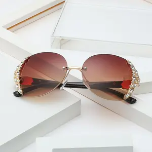 778 yeni Trendy moda güneş gözlüğü kadınlar çerçevesiz Metal güneş gözlüğü bayanlar Bling özel Logo lüks güneş gözlüğü