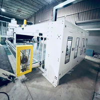 Machine à superposer les tissus à largeur personnalisable pour les grands ateliers textiles