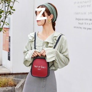 Mini mochila para mujer, bolso de viaje portátil con estampado de letras, bandolera de 7 pulgadas - Product Image 2