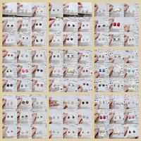 Vente en gros d'usine, bracelets, colliers et boucles d'oreilles tendance de marque de luxe pour femmes, zircon, couleurs mélangées, acier inoxydable