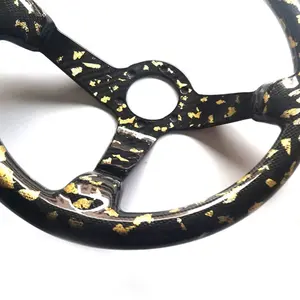 <span class=keywords><strong>Volant</strong></span> automobile en fibre de carbone personnalisé en usine et nouvellement conçu avec feuille <span class=keywords><strong>d</strong></span>'or - Product Image 6