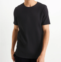 T-shirt avec logo personnalisé de haute qualité à la mode simple texturé gaufré haut ajusté T-shirt pour hommes marques de gros