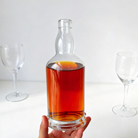 Bouteille en verre rond élégante de 700 ml et 750 ml à prix compétitif pour whisky, vodka, tequila, rhum et spiritueux avec bouchon en liège