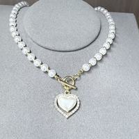 Collier OT en chaîne de perles de luxe couleur or avec pendentif cœur, perles blanches, bijoux de mariage élégants pour femmes et jeunes filles, personnalisable, vente en gros
