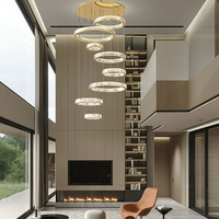 Grand lustre en cristal personnalisé en or K9 pour hôtels Lampes suspendues modernes de luxe Lustre d'éclairage à LED avec anneau circulaire pour escalier