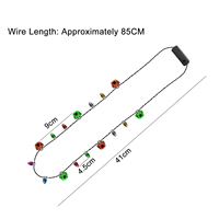 Blinkende Weihnachtsbirnen-Halskette mit LED-Beleuchtung und Glöckchen-Anhänger für Kinder und Erwachsene, Weihnachtsthema-Party-Zubehör.