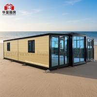 Maison conteneur préfabriquée en acier Huaying 20 pieds avec toit en panneaux sandwich, design moderne, extensible pour villa, garantie 5 ans