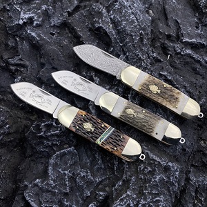 Coltello Pieghevole OEM Personalizzabile in Acciaio Damascato a Doppia Lama per Sopravvivenza, Caccia e <span class=keywords><strong>Campeggio</strong></span> con Design in Osso di Bue - Product Image 4