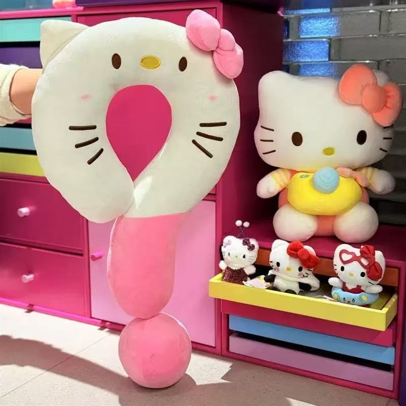 Cuscino a forma di u-rosa e bianco punto interrogativo