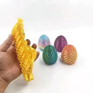 Jouet de décompression pour doigts, œuf de dragon torsadé, imprimé en 3D, rotatif et déformable, à effet d'explosion - Product Image 1